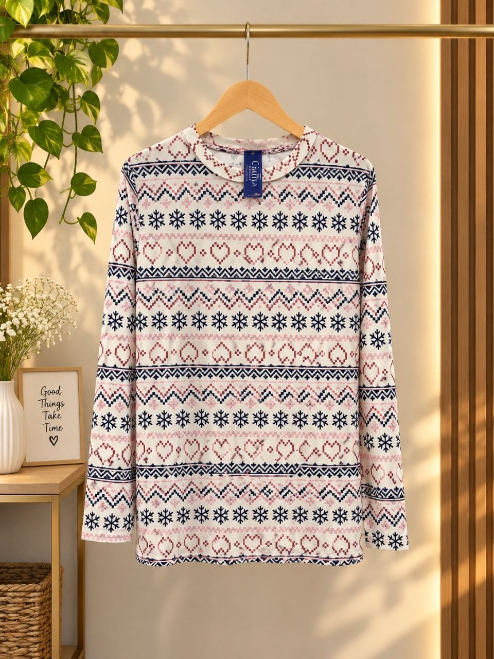 بلوز زنانه استین بلند  وارداتی برند winter warmer جنس نرم و لطیف طرح زمستانی سایز L